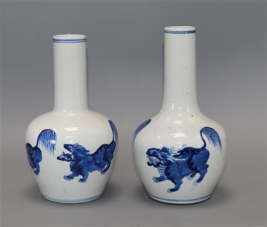A pair of Chinese blue and white bottle vases tallest 22cm